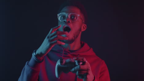 man playing video game with controller