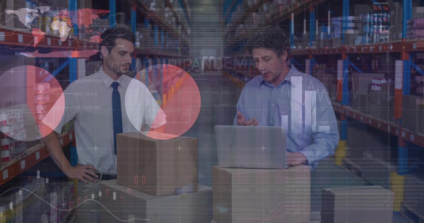 Warehouse Managers Reviewing Logistics Data on Laptop