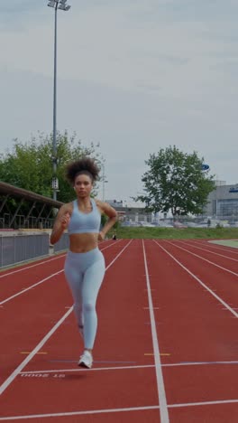 woman running on a track