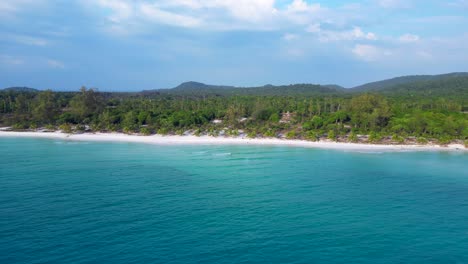 santa claus is enjoying summer holidays on a beautiful tropical beach. marvelous aerial view flight speed ramp hyper motion time lapse