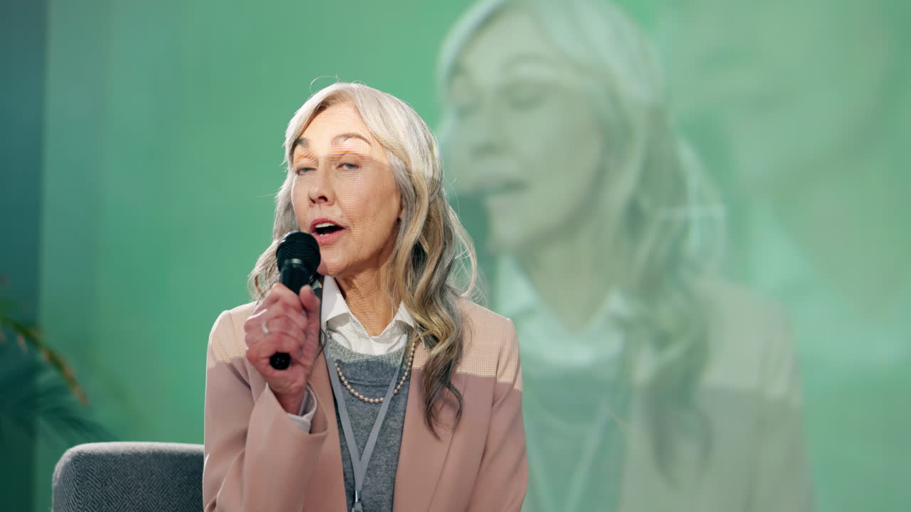 Woman giving a presentation with a microphone