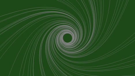 patrón en espiral de líneas negras en un fondo verde con un centro blanco