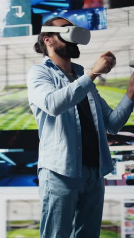 vertical video young relaxed guy uses vr glasses for a 3d user interface design