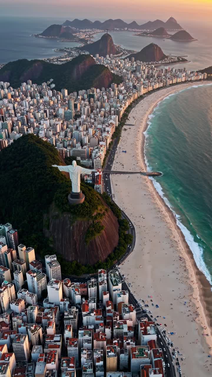 Aerial view video of Rio's coastline, showcasing the iconic Christ the Redeemer statue, cityscape