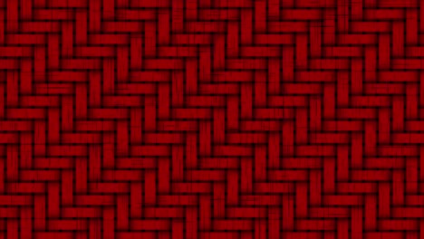 Animation-of-multiple-out-of-focus-rows-of-woven-red-and-black-zig-zag-