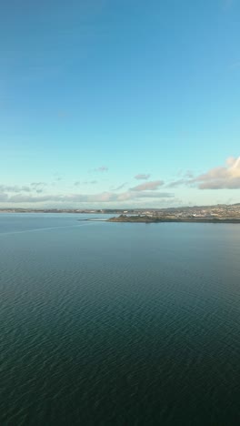 aerial view of coastal town and water