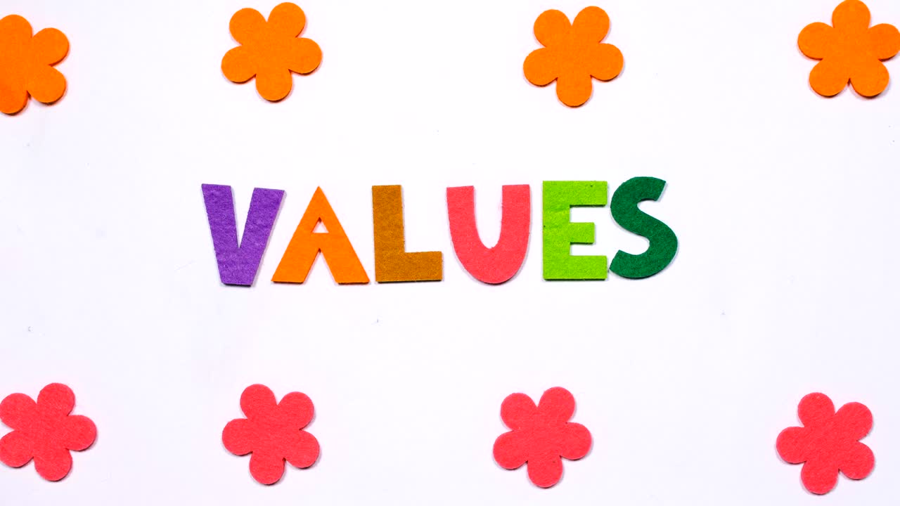 The word values. The word is made in dancing letters in colored font.