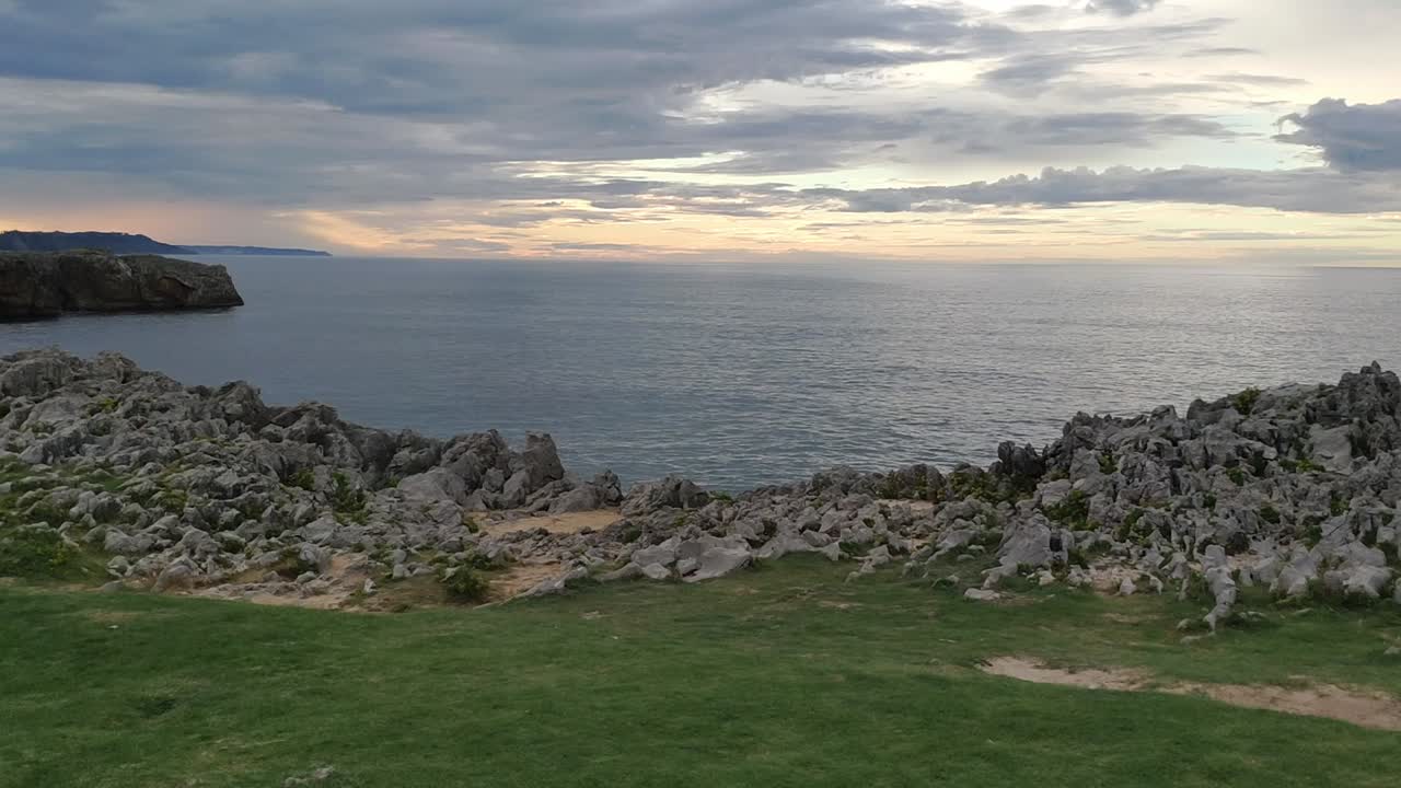 Rocky coastline and sea view at Guadamia and Tuzarrizu cliffs in Asturias, Spain