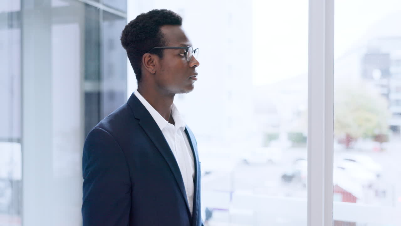 Face, business and a serious black man at a window