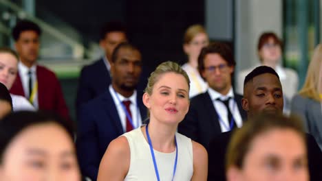 businesswoman asking a question during seminar 4k