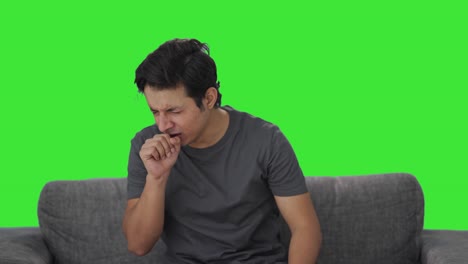 Sick-Indian-man-suffering-from-cold-and-cough-Green-screen