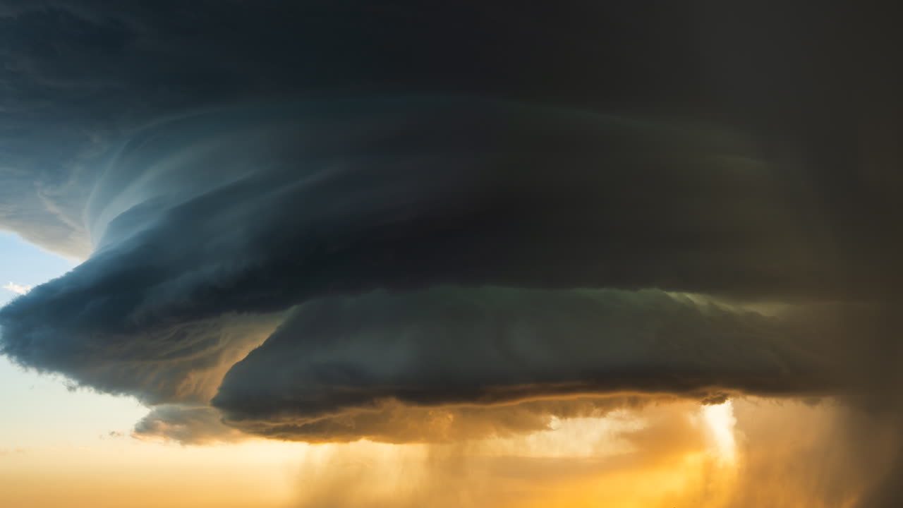 Ominous cloud formations traveling across the sky showing changing weather conditions