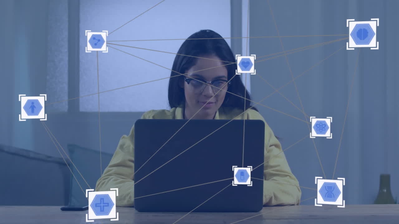 animación de la red de conexiones con iconos sobre empresario biracial usando portátil