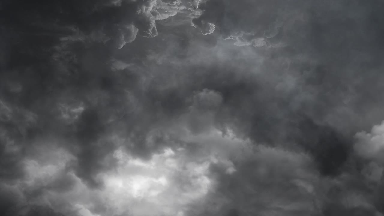 Thunderstorm lightning bolt in dark clouds