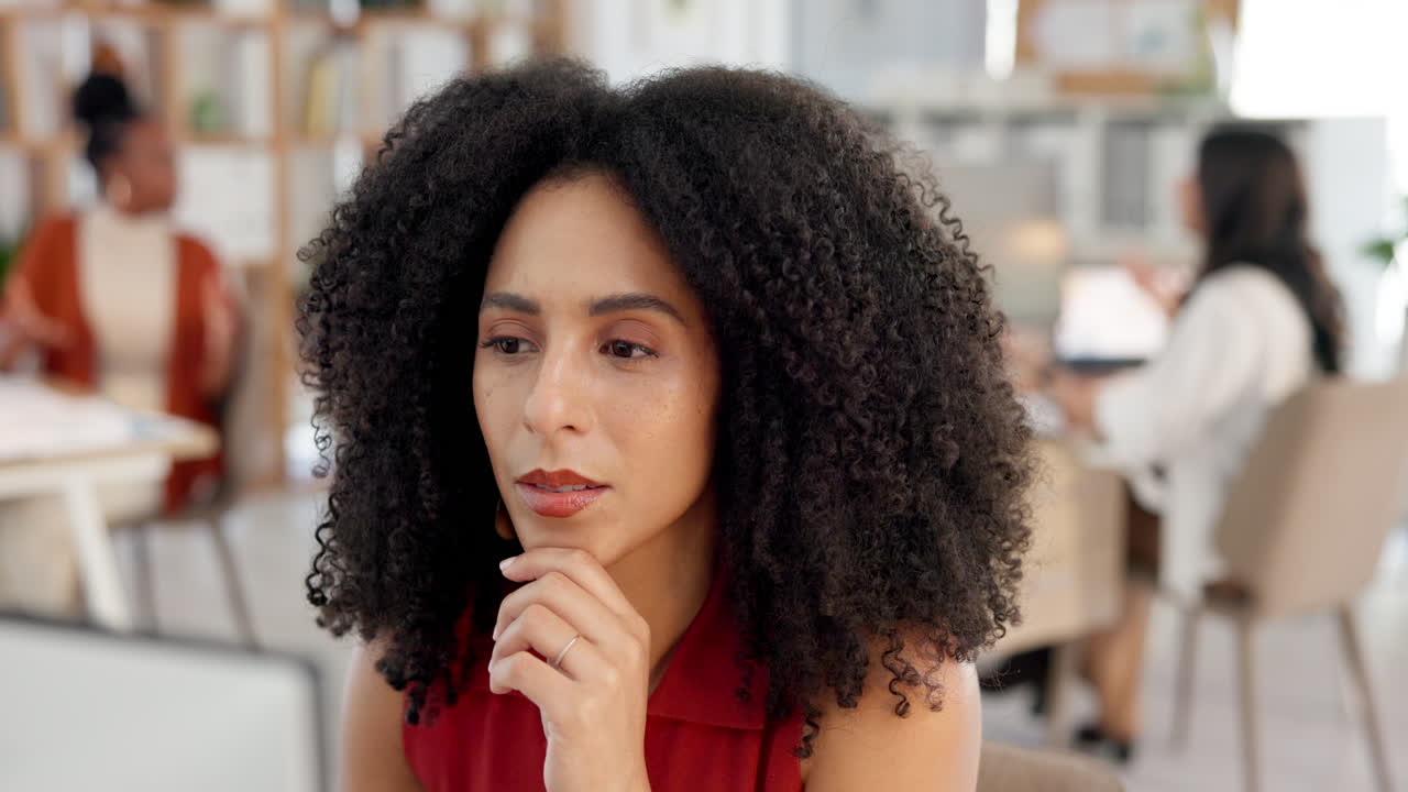 Thoughtful Businesswoman Contemplating in a Modern Office Environment