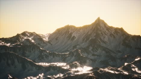 aerial view of the alps mountains in snow