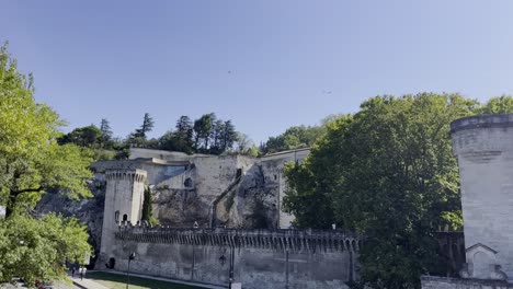 historical fortress with stone walls in the sun of avignon a french city