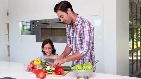 Father-and-daughter-preparing-vegetables