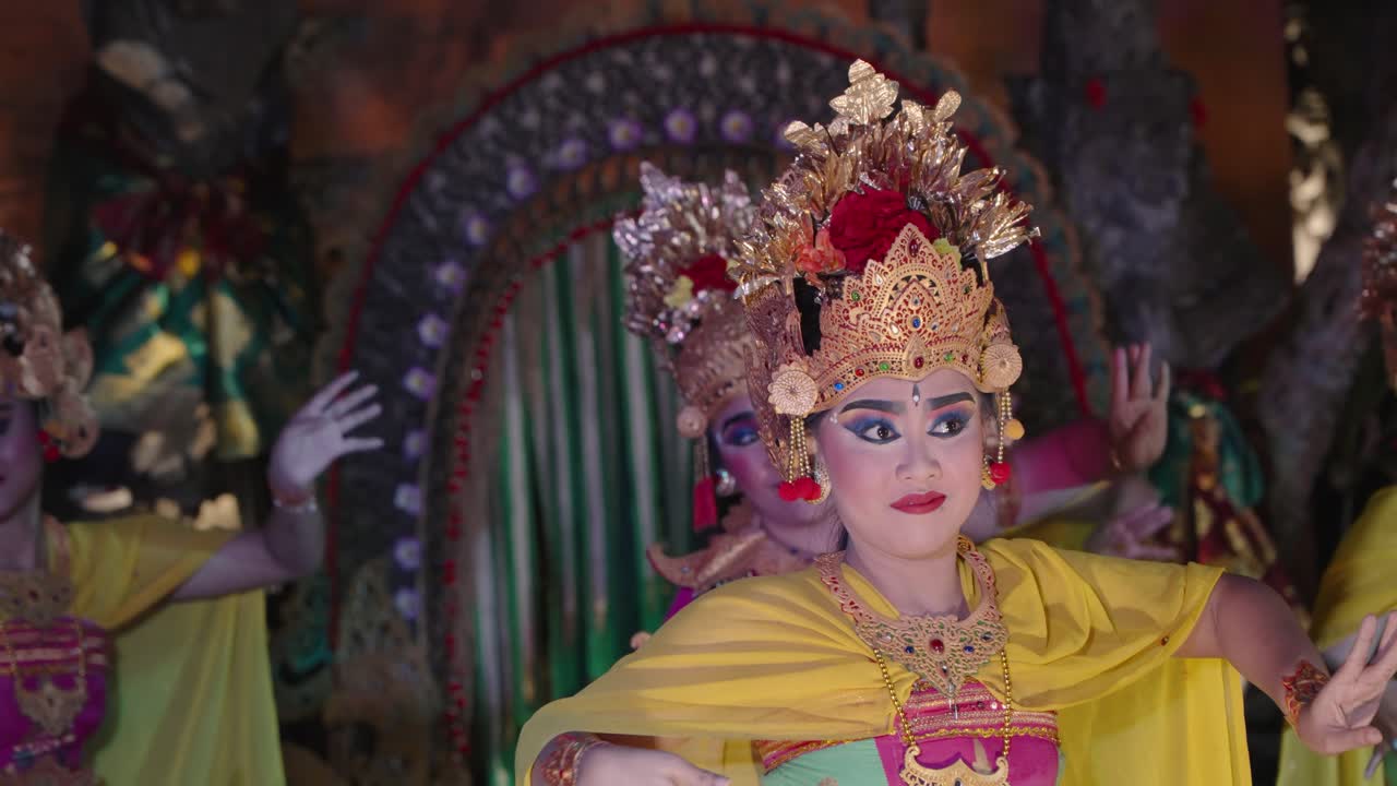 Woman Dancer Face Close-up While Dancing Legong and Ramayana Traditional Theater Dance Performance at Ubud Palace, Bali