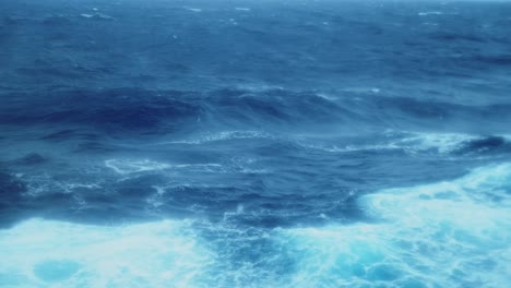 turbulent blue ocean waves during a storm