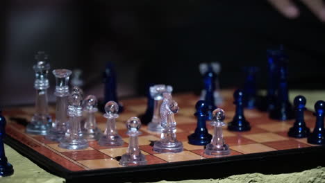 Cinematic-view-of-a-chess-board-with-glass-chess-set