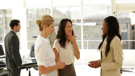 businesswomen talking together