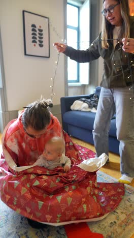 family opening christmas presents