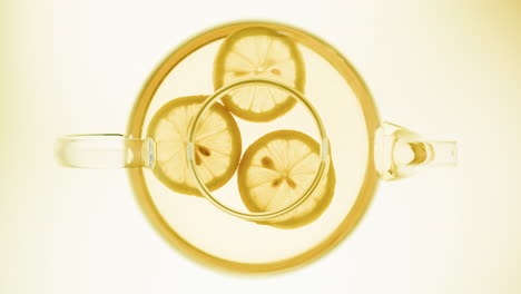 lemon tea in glass teapot