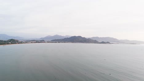 aerial view pan of the coast and the mountains in phan rang–tháp chàm.