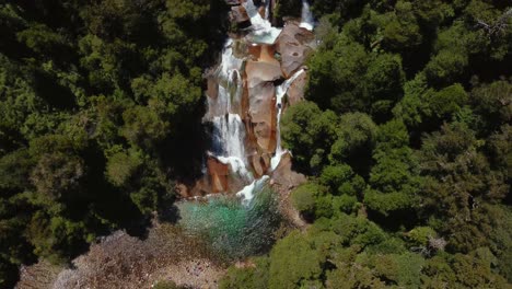 cochamó, patagonia chile, adventure tourism in the middle of nature, green forests, mountains and waterfalls with crystal clear waters