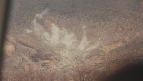 thermal landscape with steam in hakone, japan