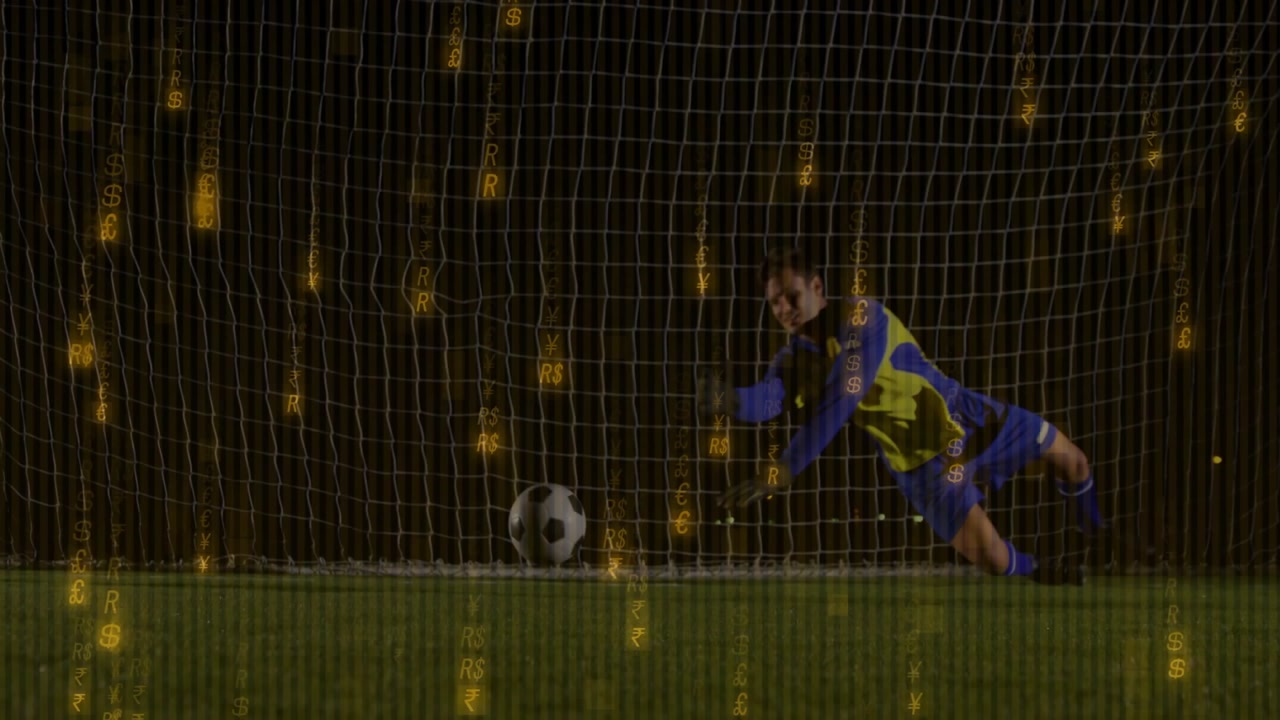 Player kicking soccer ball with tech overlay causing goalkeeper diving and securing ball on pitch