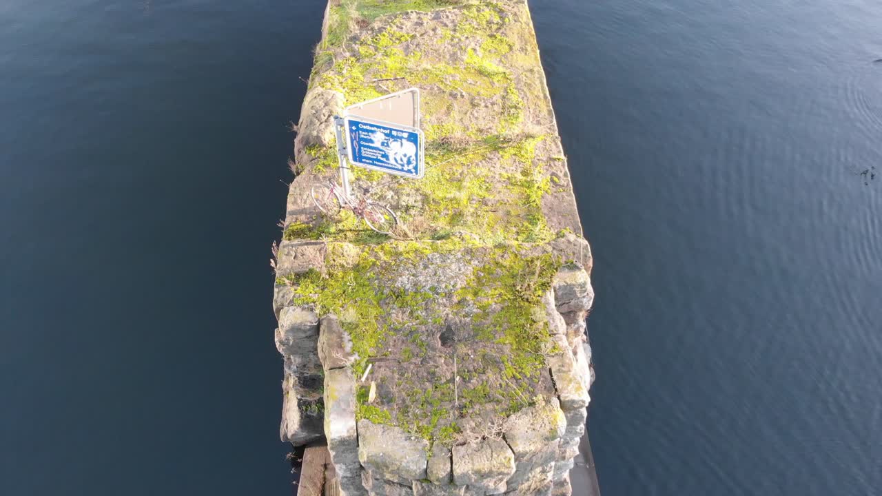 Berlin Spree Tiny Island with a bike this is a classic Berlin view recorded with a drone at 4k 24fps