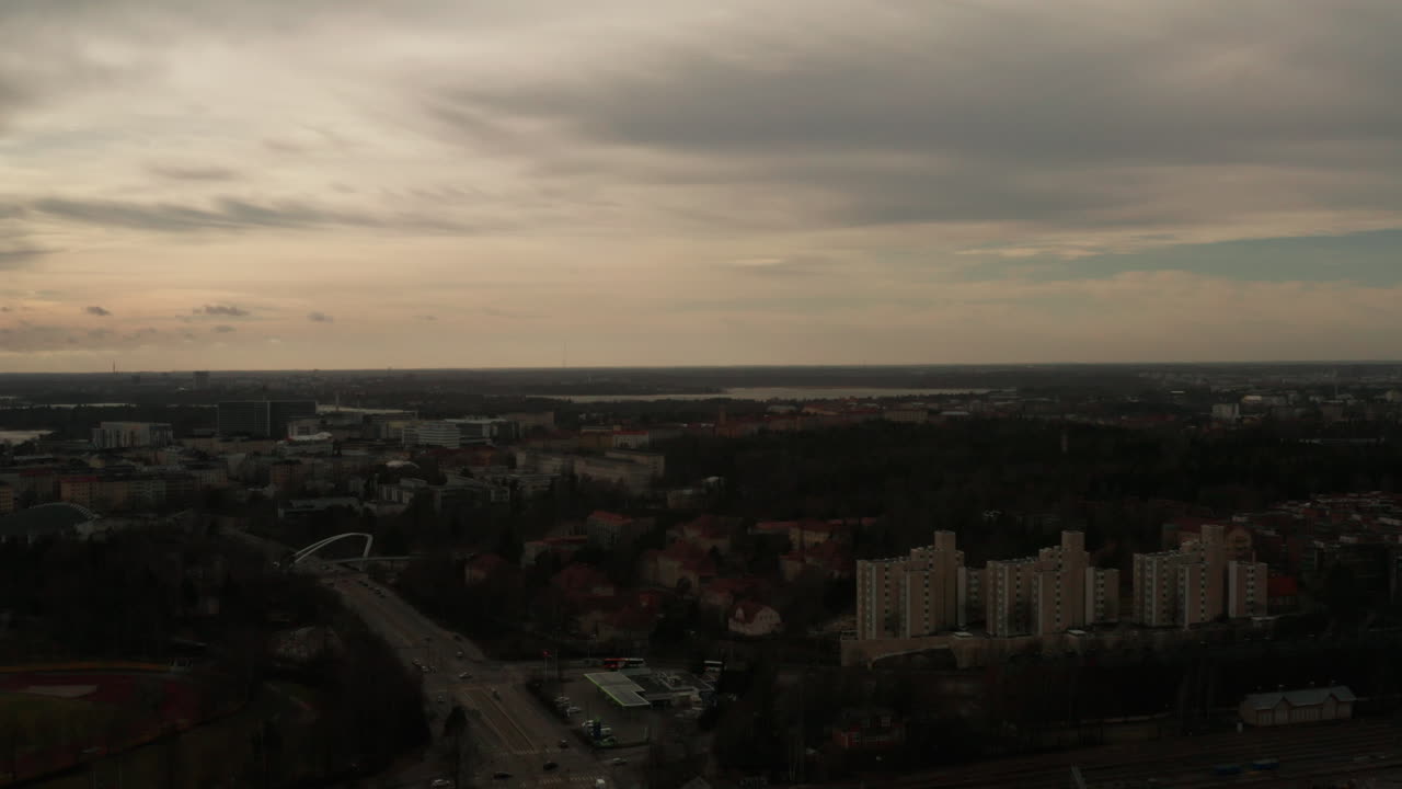 Aerial shot over a Finnish city on a cloudy cold evening