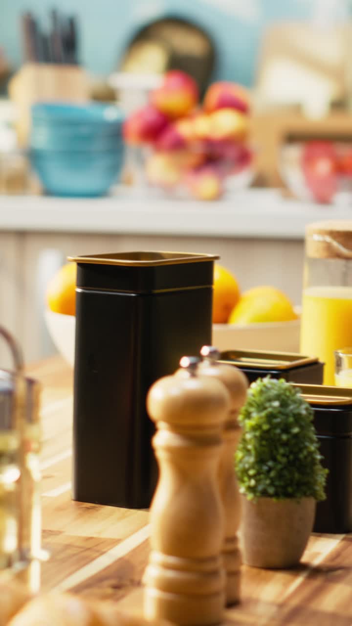 Vertical Video Empty kitchen with wooden dining furniture and modern appliances