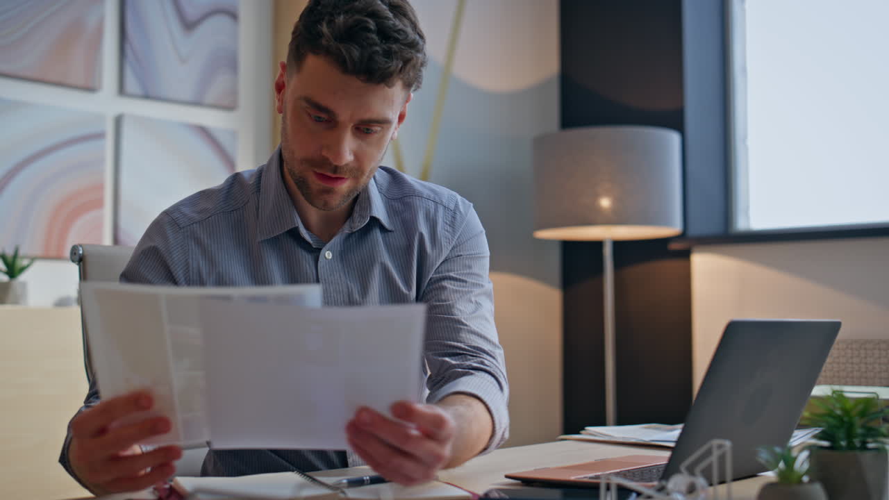 Inspired programmer typing laptop at modern agency buro closeup. Creative man