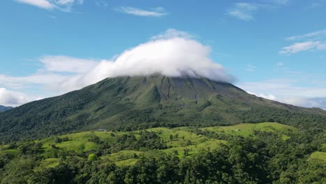 aerial view hyperlapse full shot, scenic view lenticular clouds on arena volcano in costa rica, on a bright sunny day