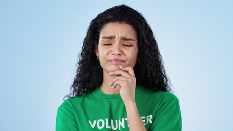 Thinking,-no-and-face-of-woman-volunteer-in-studio