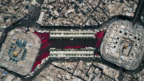 shiite pilgrims in karbala between mosques