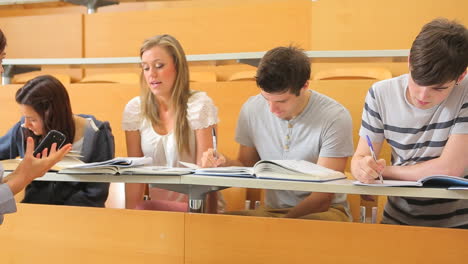 student playing with her smartphone