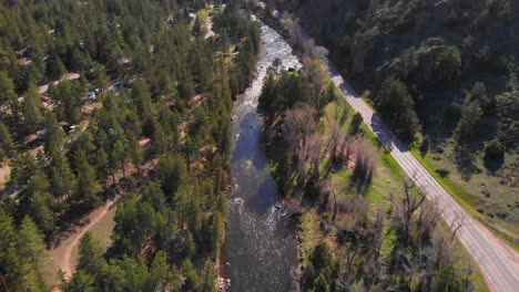 aerial view of mountain river and road