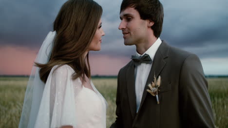 young couple in love in a fall field