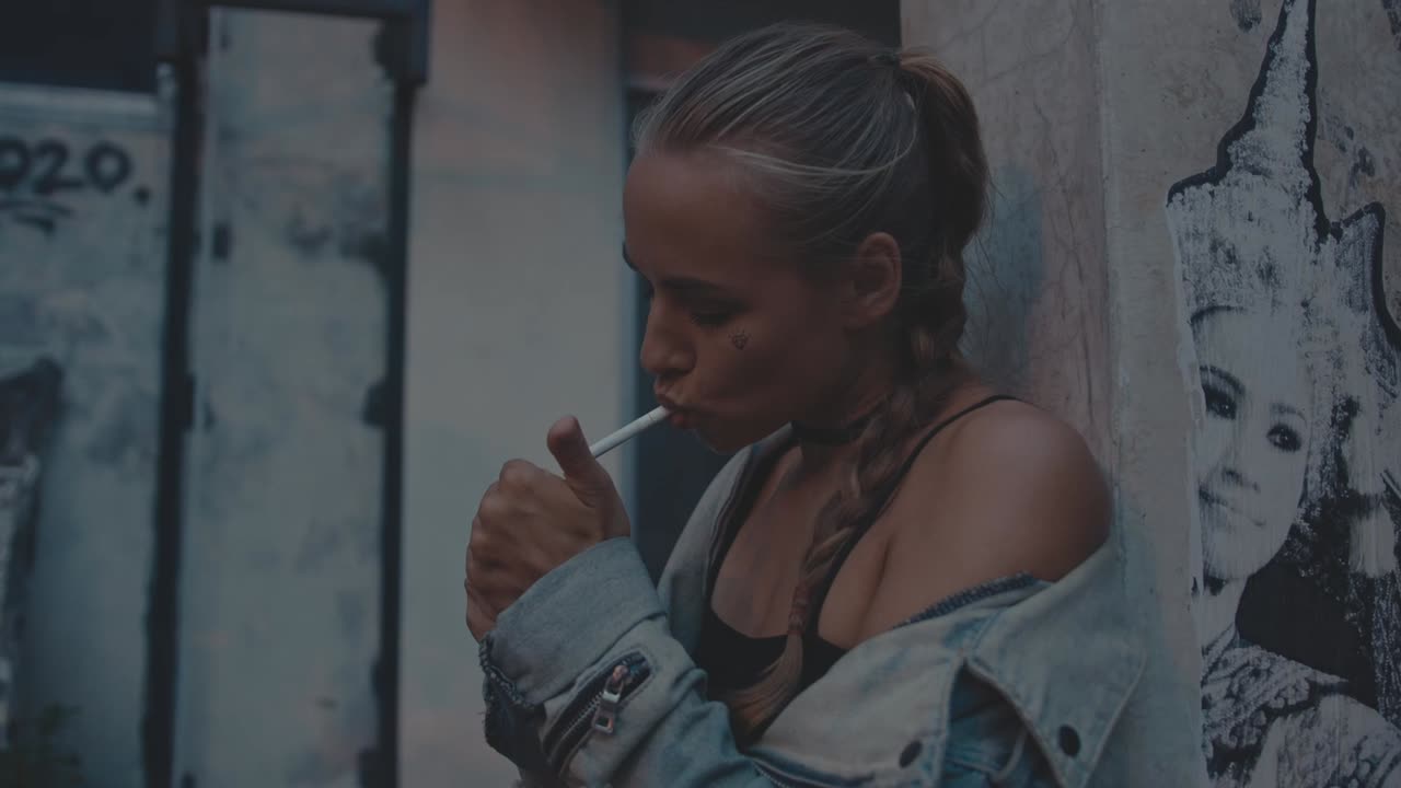 Woman Smoking in an Urban Setting