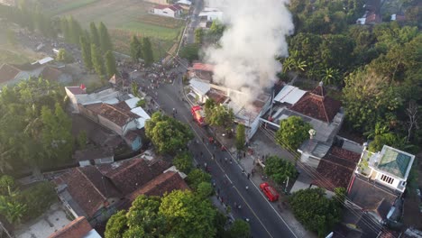 aerial view of house fires in densely populated settlements in indonesia