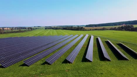 solar panels on green field with collecting sun light green energy nature preservation ecology innovation clean green living concept uhd 4k video