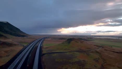 cars driving on route 1 in olfus area in southern iceland