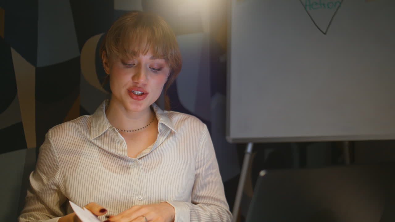 Night boss having video conference sitting with laptop closeup. Late manager