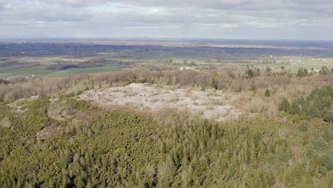 Aerial-Orbit-of-Knockma-Forest-Hilltop,-Cnoc-Meadha,-Ireland