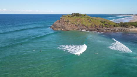 Tourists-Enjoying-The-Big-Waves-At-The-Beach-Near-Norries-Headland-At-Northeastern-NSW-In-Australia