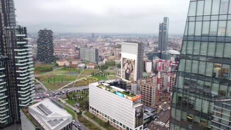 Vaserine-district-of-Milan-with-glassy-skyscrapers,-aerial-drone-view